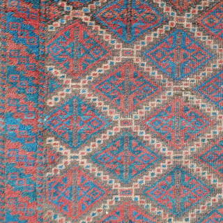 Antique Baluch small rug: Geometric Gul motif in Diamond Lattice repeat with crisp camel hair stepped outline. 33 x 58 inches.  Brilliant blues. Very good condition. Inexpensive. johnbatki@gmail.com    