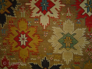 Shirvan Baku 33 Snowflake Stars long rug, 45 x 98 inches (114 x 250 cm).  -- First half 19th century. Wool  and camel hair. A whole village-ful of humanoids, plus  ...
