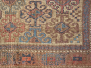 Symmetrically knotted Baluch with 43 Hooked motifs on Camel Field. 40 x 63 inches (102 x 170 cm) without kilim ends. Good condition, original goat hair side finish, end kilims rough. This  ...