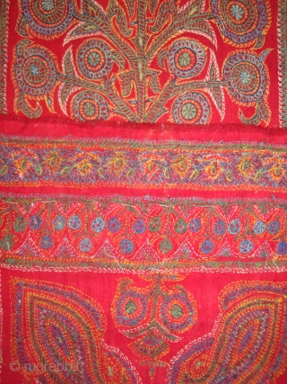 Kirman Tree under Arch embroidery, wool on fine red pashmina plain weave. 30 x 108 inches. Circa 1900.               