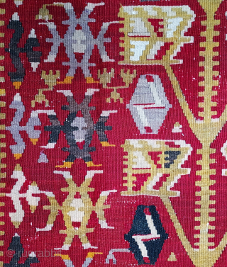 Mid-20th century Anatolian small Tree kilim, 3'2" x 4'6". Robust yellow gold Tree with 5 pairs of geometrically stylized leaves, each containing 5 smaller leaf forms, on a deep crimson field. Broad  ...