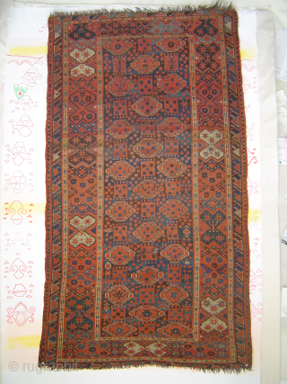 Unusual 19th century Middle Amy Darya Beshir small carpet, 130 x 185 cm (4'3" x 6'1"). ---Three Stacks of Guls alternating with squares containing a Quincunx of 5 dots. "Bowtie" border. Delightful  ...