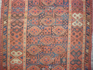 Unusual 19th century Middle Amy Darya Beshir small carpet, 130 x 185 cm (4'3" x 6'1"). ---Three Stacks of Guls alternating with squares containing a Quincunx of 5 dots. "Bowtie" border. Delightful  ...