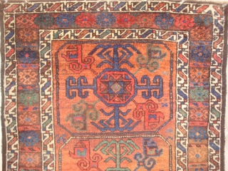 Symmetrically knotted Baluch with 3 Octagon Guls, 34 x 55 inches. An unusual late-19th century weaving in  excellent condition. The dull photos do not do justice to the lavishly used sparkling  ...