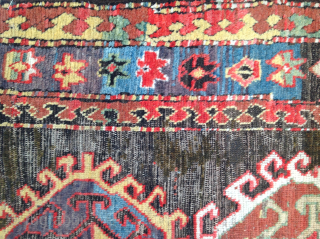 Dramatic and exceptional Caucasus long rug, 5 diversely drawn Hooked Diamonds on Dark Brown-Black Field, 104 x 244 cm  (3'5" x 8'). Coarse, irregular weave, deep saturated reds, greens, blues, yellows  ...