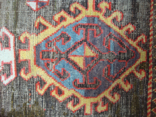 Dramatic and exceptional Caucasus long rug, 5 diversely drawn Hooked Diamonds on Dark Brown-Black Field, 104 x 244 cm  (3'5" x 8'). Coarse, irregular weave, deep saturated reds, greens, blues, yellows  ...