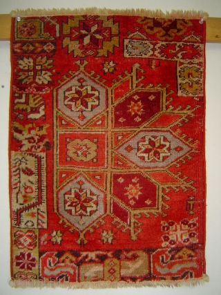 Antique Central Anatolian vagireh yastik with Crivelli Star motif. 19.5 x 26 inches (50 x 66 cm) Unique early XX. century village weaving. Please inquire at jbatki@twcny.rr.com      