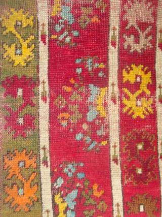 Highly unusual antique Anatolian yastik, 19 x 43 inches. I have not seen this design before. The motifs resemble those seen in North African, Moroccan embroideries. The colors have the convincing depth  ...