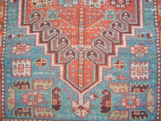 Sparkling little Anatolian yastik with rare gul and a mini=prayer design. Both madder and cochineal reds. Luminous silky angora-like wool. One end reduced, and so is the price.     