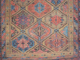 Baluch Gul Lattice Rug, symmetrical knots, possibly Bahluli, 33 x 61 inches.  Late 19th century.  These photos cannot convey the variety of vivid colors including a deep Aubergine (the lattice,  ...