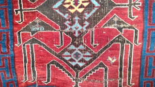 Archaic Antique Avar rug, 37 x 47 inches. Good pile, original sides and ends. Three horizontal crease slashes in field, and one vertical one at lower end. Large central motif usually seen  ...