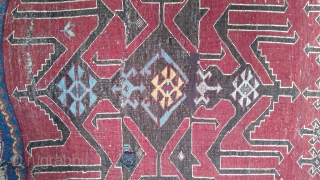 Archaic Antique Avar rug, 37 x 47 inches. Good pile, original sides and ends. Three horizontal crease slashes in field, and one vertical one at lower end. Large central motif usually seen  ...