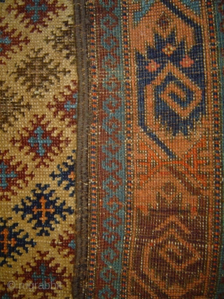 Singular Baluch prayer rug, with 159 snowflake stars in a staggered repeat on the camel field. 34 x 54 inches. Each star contains a small "cross le-boutonnee". Dramatic use of a sizzling  ...