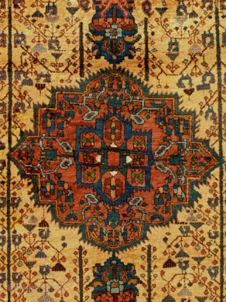 Early 20th century Afshar rug, 1.75 x 1.45m. Unusual in the absence of corner elements; very beautiful tree-of-life motif with birds and hanging flowers. Good pile; natural dyes, with golden yellow field.  ...