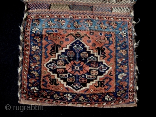 Finely woven Afshar khorjin, probably older than usual. Some wear and damage, but a graceful and restrained example.               