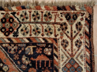 Small South Persian rug, probably Khamseh, with many intriguing features, including camels and a very attractive border. End losses and some ground showing, but overall in good condition. 1.40 x 1.08 m. 