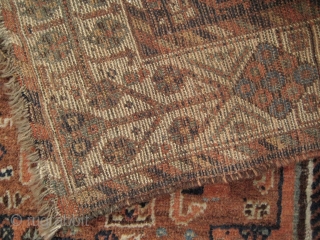 Small South Persian rug, probably Khamseh, with many intriguing features, including camels and a very attractive border. End losses and some ground showing, but overall in good condition. 1.40 x 1.08 m. 