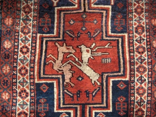 Luri long rug, c.1900, with a rare resign that includes a tree of life, various amusing animals and a pair of amorous deer. 280 x 115 cm, in great condition. Coarsely woven  ...
