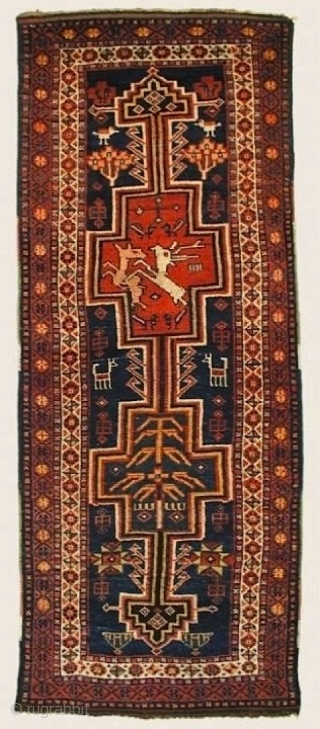 Luri long rug, c.1900, with a rare resign that includes a tree of life, various amusing animals and a pair of amorous deer. 280 x 115 cm, in great condition. Coarsely woven  ...