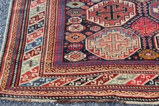 Caucasian Shirvan long rug with Memling Gul design dated 1319 or 1901.  Measures 4'3'' x 8'0''.  Vibrant colors with some early synthetics.  Good pile with some restoration and replaced  ...