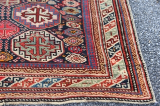 Caucasian Shirvan long rug with Memling Gul design dated 1319 or 1901.  Measures 4'3'' x 8'0''.  Vibrant colors with some early synthetics.  Good pile with some restoration and replaced  ...