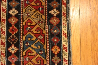 1870s Caucasian Shirvan.  4'2'' x 8'4''. Well drawn example.  Some wear and repair.  Natural colors. 

Ebay Item # https://www.ebay.com/itm/143500147907           