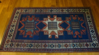 1900 Caucasian Kazak Leshgi Star.  48 x 78 inches.  Low even pile.  No damage or repairs.  Nice natural colors.          