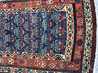 This antique rug is a stunning piece from the Caucasian region of Azerbaijan, dating back to the 1920s. Measuring 64 inches by 32 inches, it features a beautiful multicolor design that is  ...