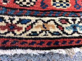This antique rug is a stunning piece from the Caucasian region of Azerbaijan, dating back to the 1920s. Measuring 64 inches by 32 inches, it features a beautiful multicolor design that is  ...