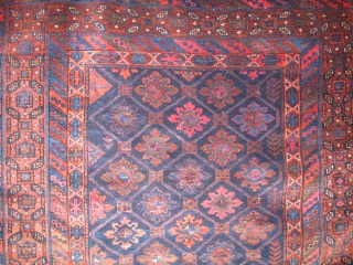 antique Baluch rug, Northest Peersian (Khorrosan), silky lustrous wool that shines. Good complete condition. There is cochineal in this piece along with three very small highlights with fuchsine  in the striped  ...