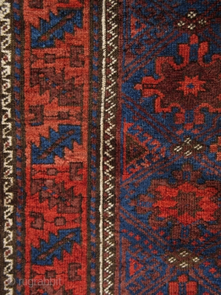 Superbly executed Northeast Persian Belouch Rug from the turn of the 19th century
with lustrous blues, an animated main field, and a crisply articulated design.
(3' x 4'8")
       