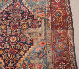 Persian rug with Kurdish characteristics and Bidjar format from the 4th
quarter of the 19th century. Unusual and attractive combination of design
and colors. Condition - wear in middle. (Dimensions: 4'5" X 6') #5315 