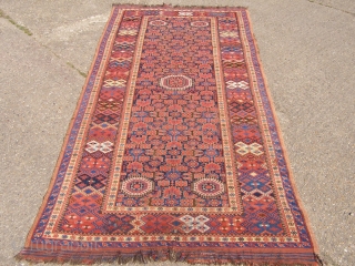 A Beshir carpet, Turkmenistan, mid 19th century.   Good vegetable dyes.  A beautiful piece.   Damaged kilim ends, some minor wear and moth damage (see detailed images).    ...