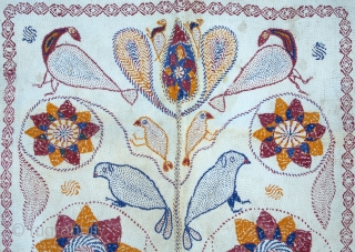 A multicolor Sujni kantha quilt from the Bengal,Asia. This beautiful piece is an embroidered ceremonial wrap done with cotton thread in red, blue and yellow and black border, with a white running  ...