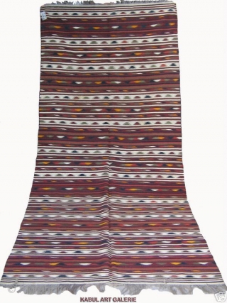 Antique Turkoman Kashgar Kilim. One of the few types of Oriental Kilims.

The extremely fine wool of this Kilim is so soft that it could be mistaken for a shawl.

Kashgar, the principal town  ...