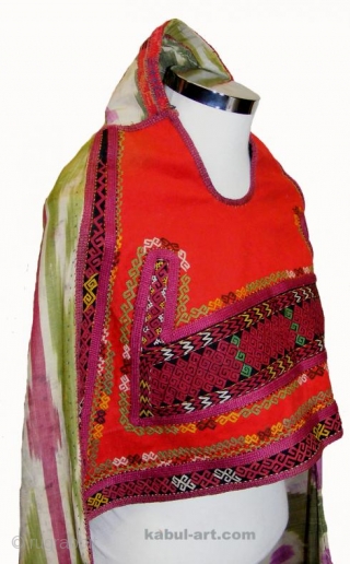 The Karakalpak kiymeshek is a woman's head veil, which covers the hair and uppermost part of the body but leaves the face exposed. It was always worn with a matching turban. It  ...