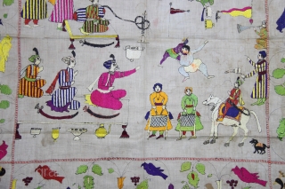 A Rumaal hand-embroidered in the typical style of Chamba, Himchal Pradesh, India. This Rumaal depicts a wrestling match being enjoyed by q King and several of his courtiers, servants, musicians playing the  ...