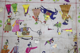 A Rumaal hand-embroidered in the typical style of Chamba, Himchal Pradesh, India. This Rumaal depicts a wrestling match being enjoyed by q King and several of his courtiers, servants, musicians playing the  ...