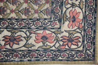 An excellent royal Mughal textile decorated with typical floral patterns all over. Thick silver strips have been used within the embroidery all over the textile.        