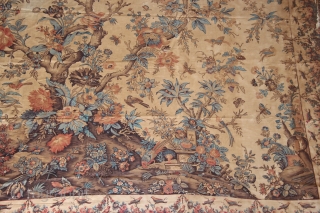 An extremely rare large sized colourful Palampore block-print textile richly decorated with a tree bearing flowers and fruits, flanked by two smaller plants and surrounded by flowers, resting birds, birds in flight,  ...