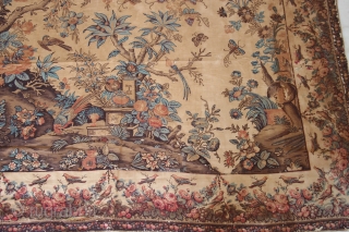 An extremely rare large sized colourful Palampore block-print textile richly decorated with a tree bearing flowers and fruits, flanked by two smaller plants and surrounded by flowers, resting birds, birds in flight,  ...