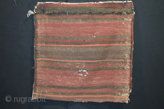 Rare type of Baluch Bagface end of 19th century. 100% tribal art.
coroded brown 100% natural colors.                 