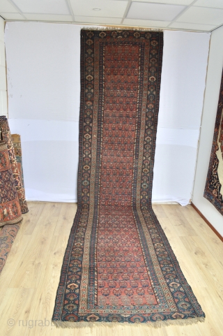 Wonderful antique North West Area Kurdish Runner or long rug … great so called boteh  or shawl pattern…
With beautiful natural colours and uniformly low pile  great character 1900-1920 period 
Missing  ...