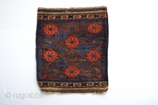 Antique small Baluch Bagface... Beautiful colors and character
coroded black/brown as found 59 x 48 centimeters                  