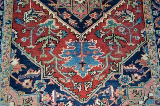 This lovely little rug from Heriz in north west persia was made in the first quarter from the 20 century circa 1900-1920.Good pile some low spots. not worn.Good natural colors. Rare in  ...