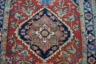 This lovely little rug from Heriz in north west persia was made in the first quarter from the 20 century circa 1900-1920.Good pile some low spots. not worn.Good natural colors. Rare in  ...