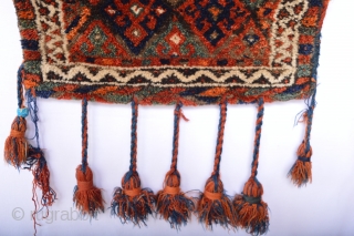 Full Pile and compleet old Senjabi Kurd Bag
Clean Meaty wool and the tassels are original Untuched and collection ready
50 x 52 cm.           