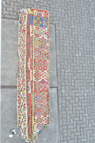Music for the eyes colours of a central Anatolian Kilim fragment 
first half 19th century as found as is great sized fragment about 390 x 90 cm 
     