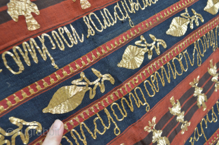 Here is a very decorative ,antique and collectible Genuine Sumatra woman's ceremonial skirt  (Tapis )  
The designs are made of Gold -Wraped treads on silk and cotton  with many  ...