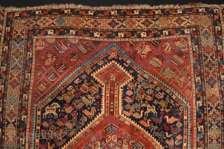 Stunning Antique Khamseh Confederacy Rug . Strong all natural  vegetable colors ,represent the tribal live at the end of 19th century with the goats, birds and animals :)
ends need  secured  ...